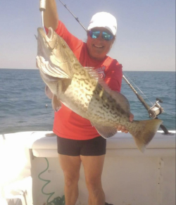 Woman holding fish